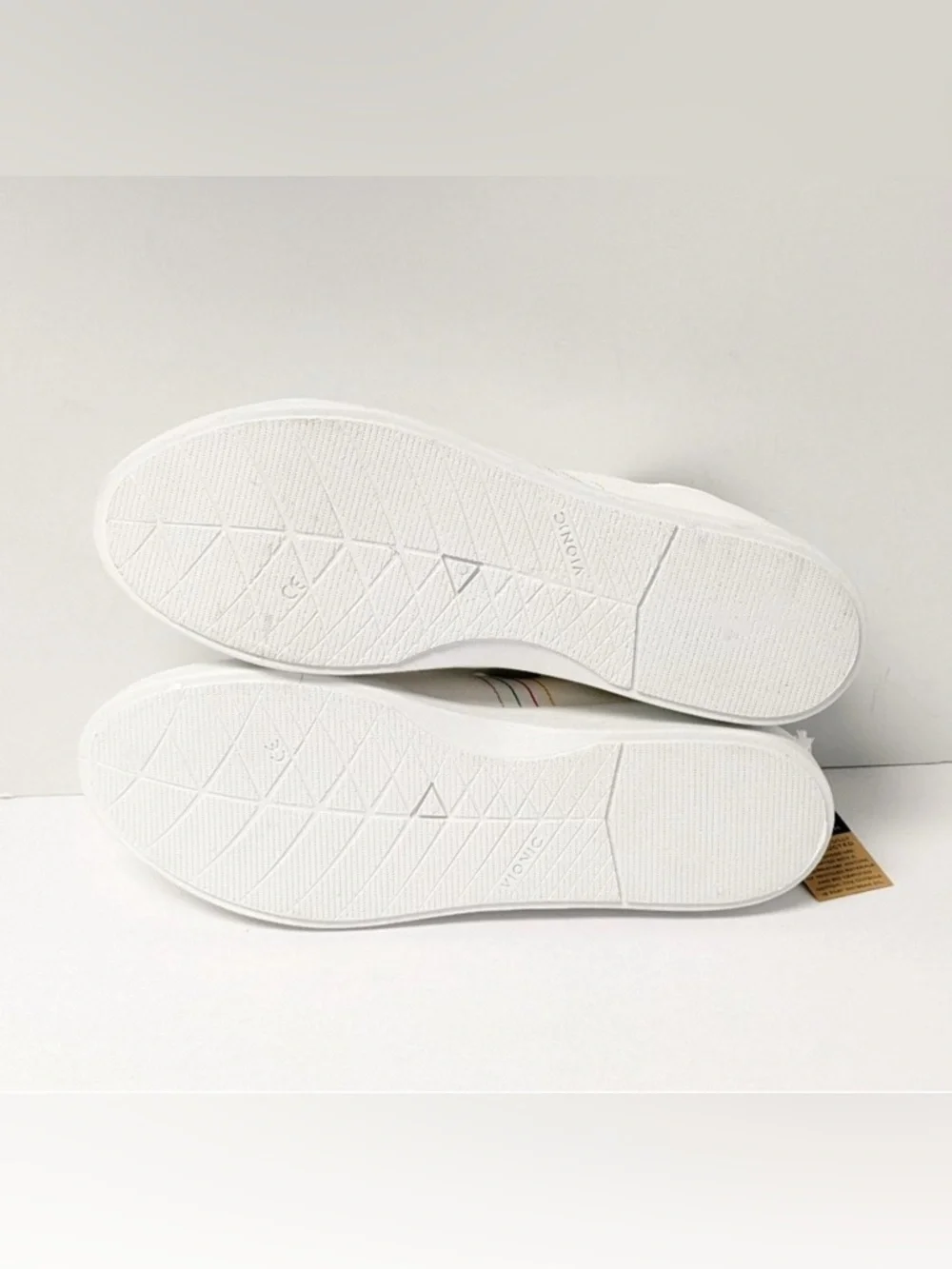 Vionic Beach Sneakers with Green Eyelets and Stitching